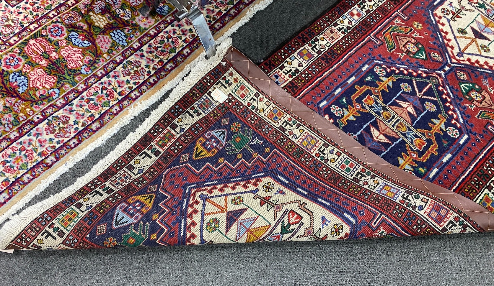 A Caucasian design red ground runner, 290 x 76cm